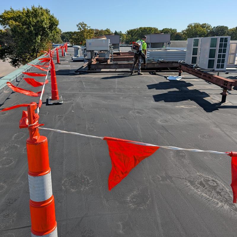 EPDM commercial flat roof with safety flags