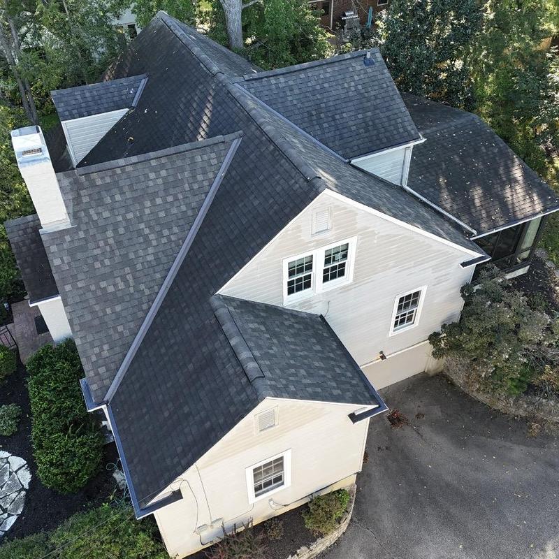 Asphalt shingle roof inspection with aluminum gutters