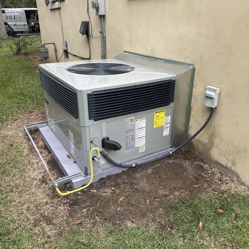 Gas pack unit installed outdoors on concrete slab Gas pack unit installed outdoors on concrete slab