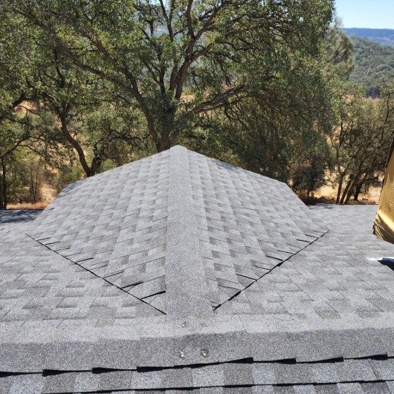 50-year GAF asphalt shingle roof with ridge cap installation