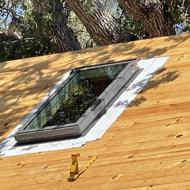 Velux skylight with impact glass on new roof deck