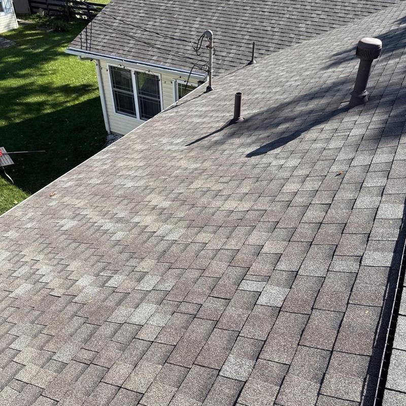 GAF shingle roof with vents on residential home