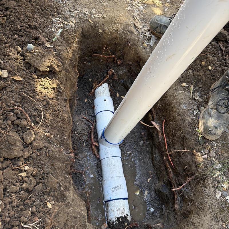 Storm drain pipe with new fittings in trench Storm drain pipe with new fittings in trench