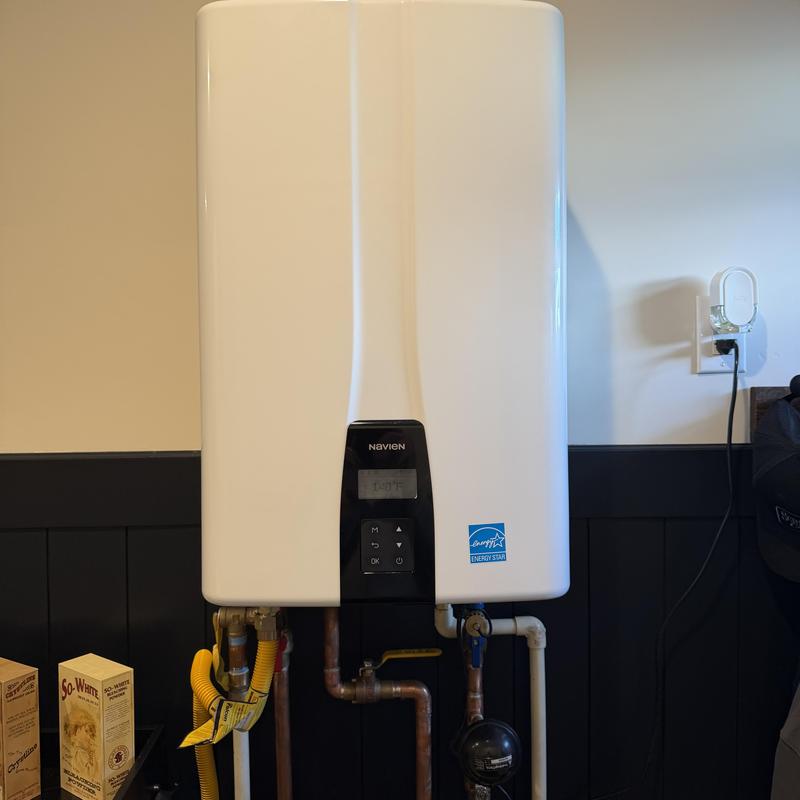 Tankless water heater with recirculation line installed Tankless water heater with recirculation line installed