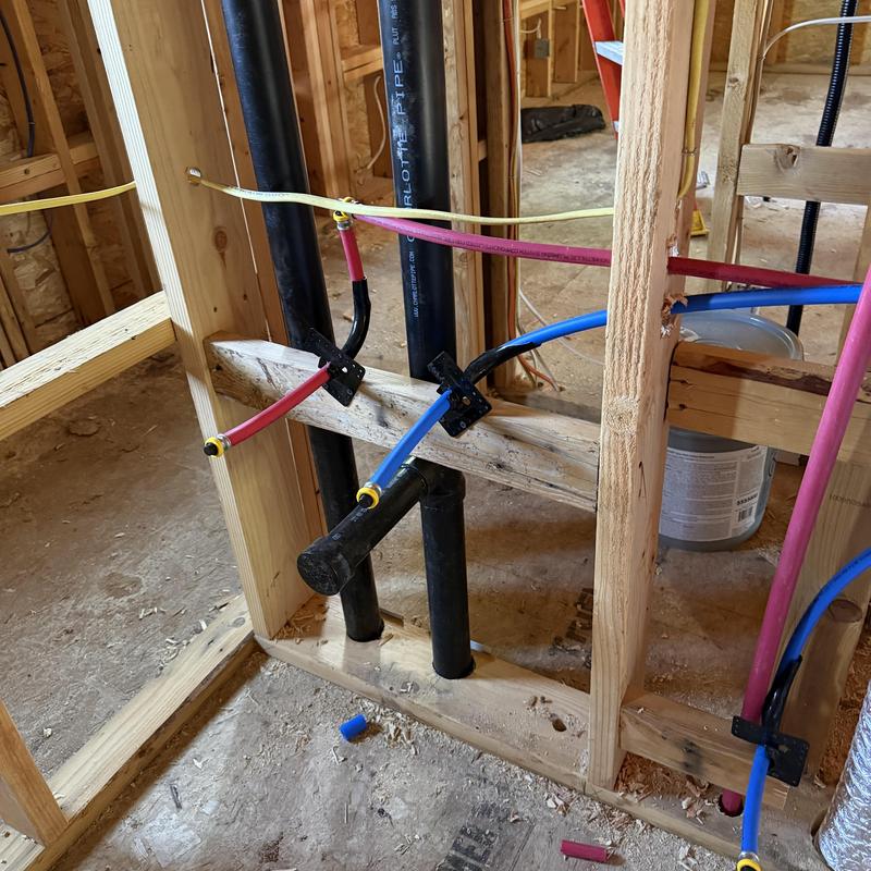 Rough-in plumbing with PEX pipes and waste lines Rough-in plumbing with PEX pipes and waste lines