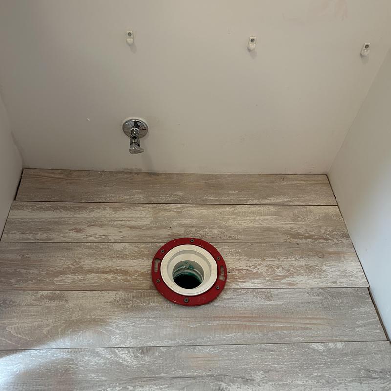 Toilet flange and angle stop installation in bathroom Toilet flange and angle stop installation in bathroom
