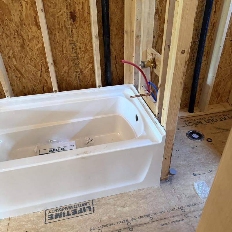 Bathtub plumbing rough-in with water and drain lines Bathtub plumbing rough-in with water and drain lines