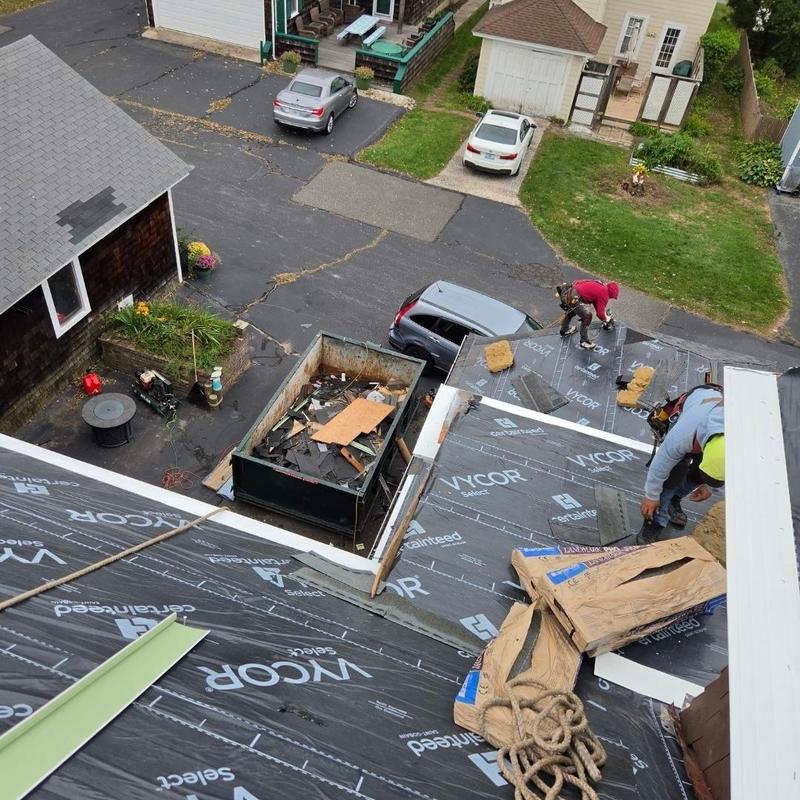 Ice and water shield installation on roof in New London
