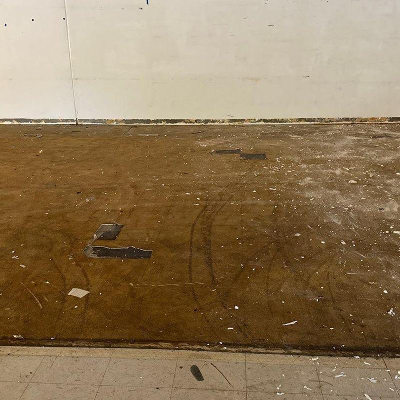 Concrete floor ground prep in warehouse space Concrete floor ground prep in warehouse space