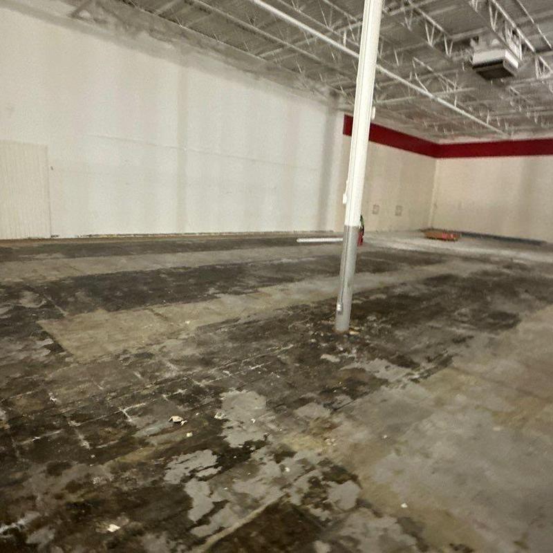Concrete floor surface prep in commercial warehouse Concrete floor surface prep in commercial warehouse