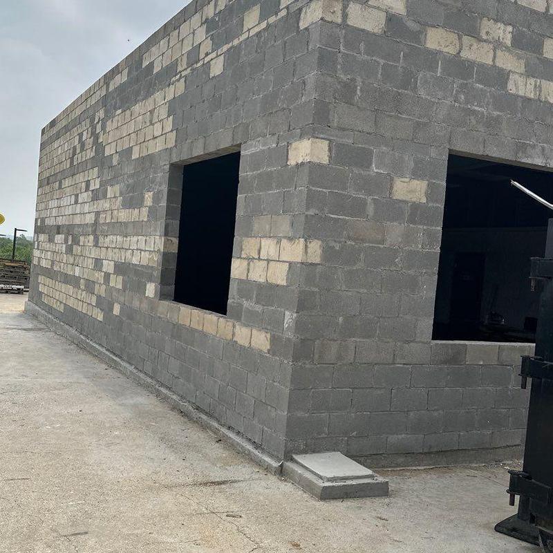 Concrete block walls with window openings under construction Concrete block walls with window openings under construction
