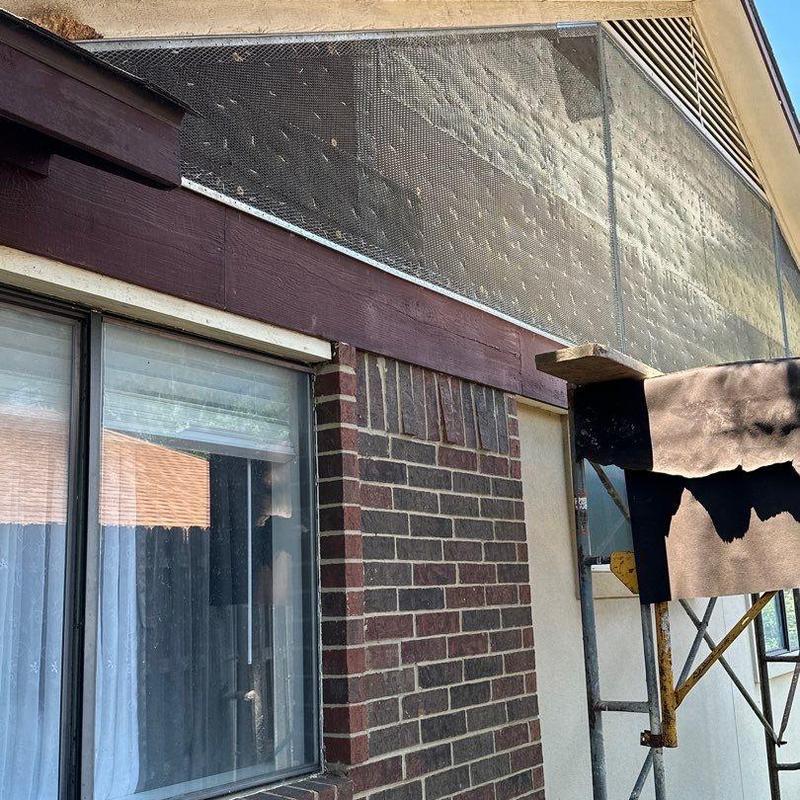 Stucco repair with metal lath on upper gable area Stucco repair with metal lath on upper gable area