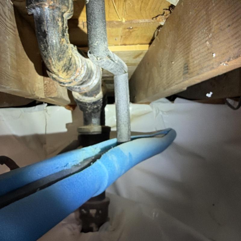 Pex pipe insulation damage under wooden floor joists