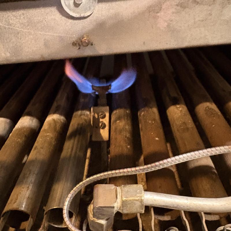 Natural gas fire boiler burner with new gas valve installed