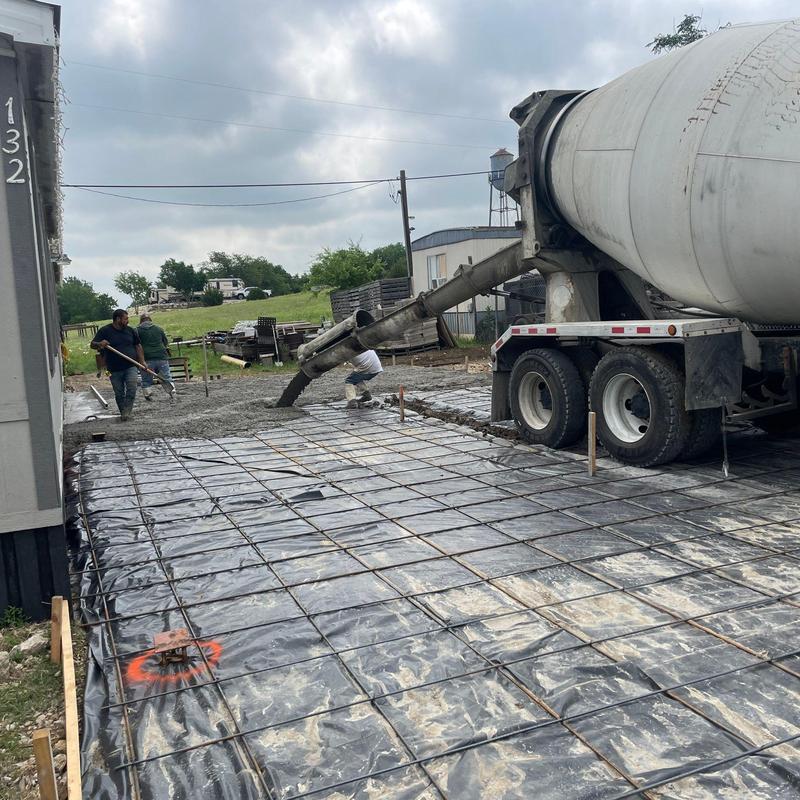 Concrete driveway pouring with reinforcing steel grid Concrete driveway pouring with reinforcing steel grid