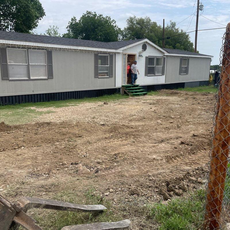 Driveway site preparation and grading at mobile home Driveway site preparation and grading at mobile home
