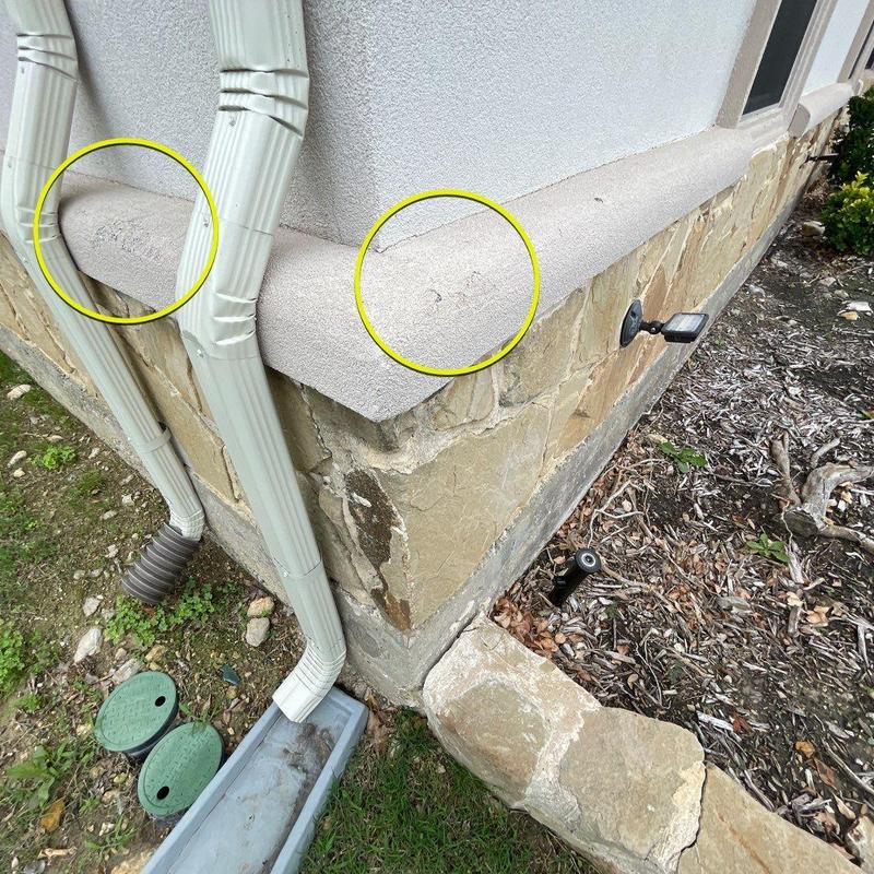 Stucco corner and lower wall damage near downspouts Stucco corner and lower wall damage near downspouts