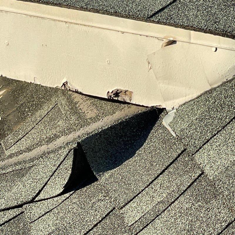 Roof shingles and fascia damage with peeling paint Roof shingles and fascia damage with peeling paint