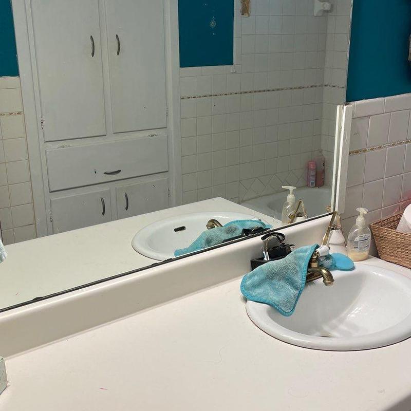 Bathroom sink and vanity with mirror reflection Bathroom sink and vanity with mirror reflection