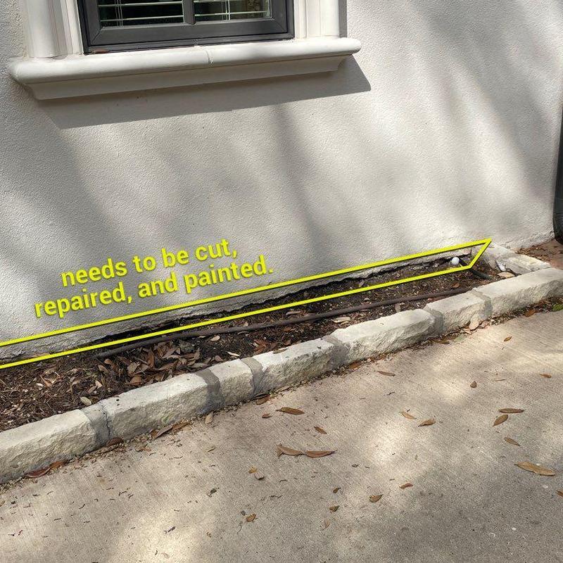 Stucco exterior wall base needing repair and paint Stucco exterior wall base needing repair and paint