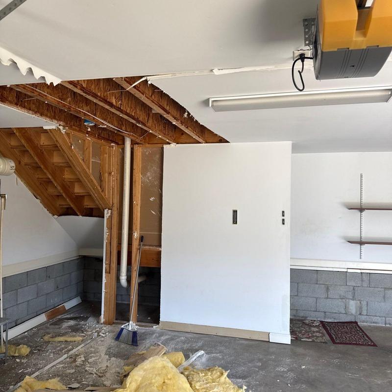 Garage drywall and ceiling with water damage repairs
