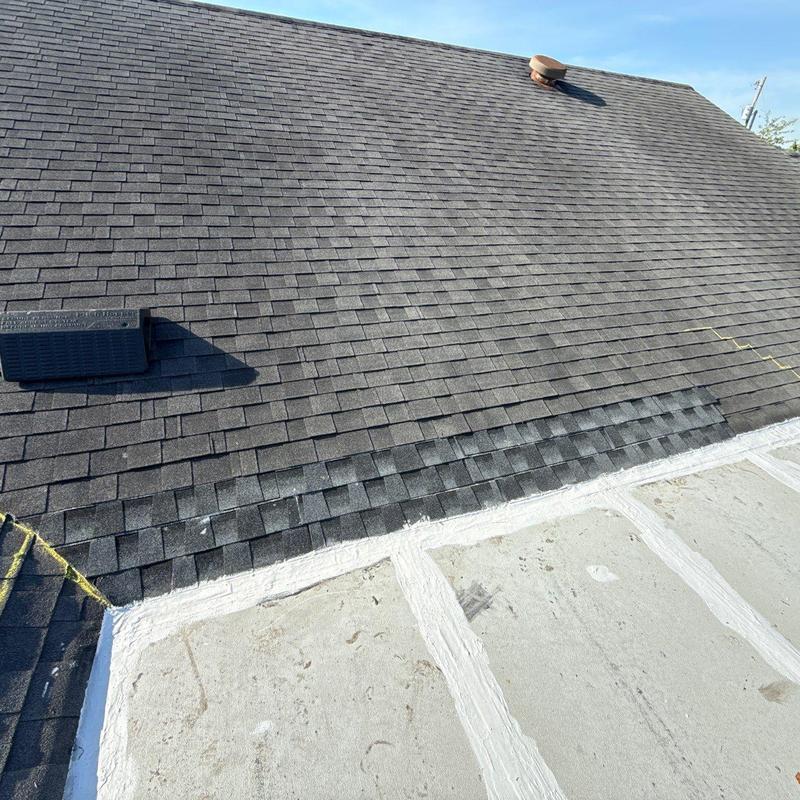 Asphalt shingle roof and flashing inspection with chalk marks