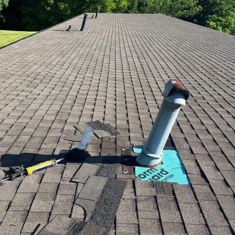 Roof vent flashing with damaged shingles and repair materials