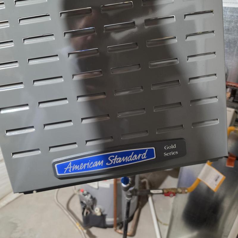 American Standard furnace panel close-up with vents American Standard furnace panel close-up with vents