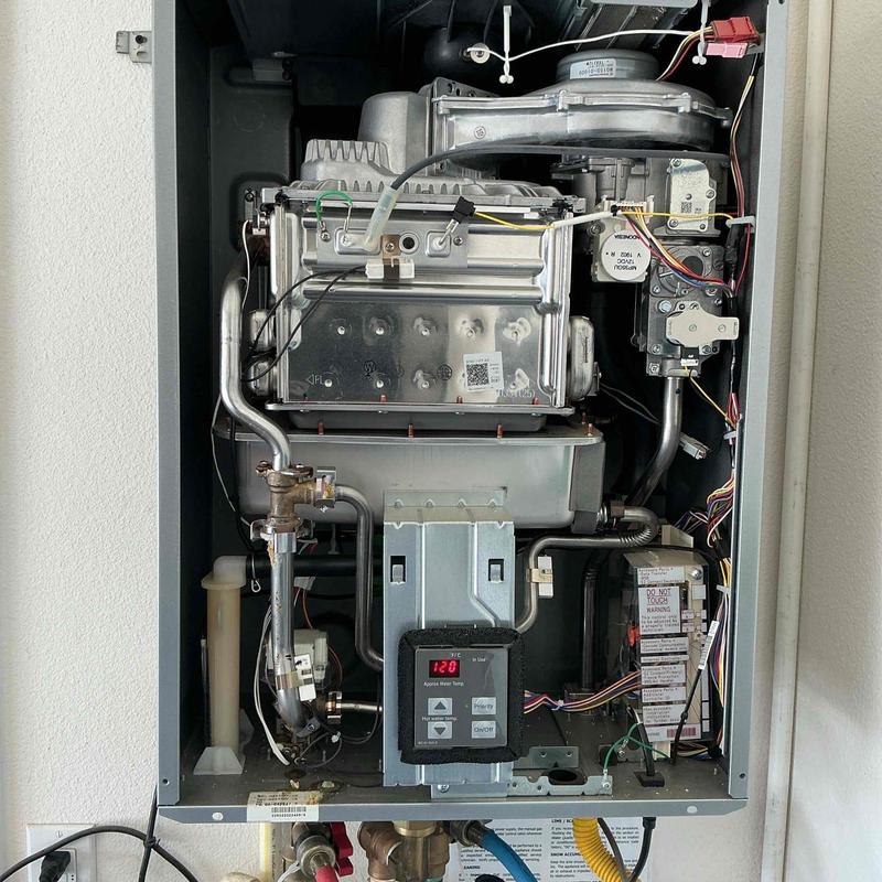 Tankless water heater internal components and piping