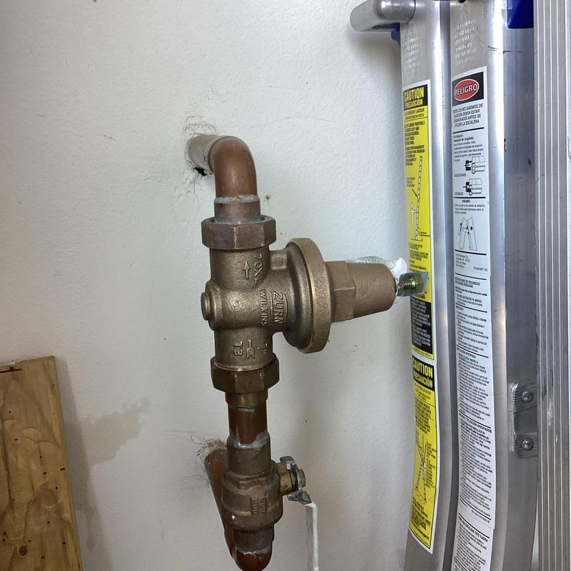 Pressure reducing valve installed on copper piping