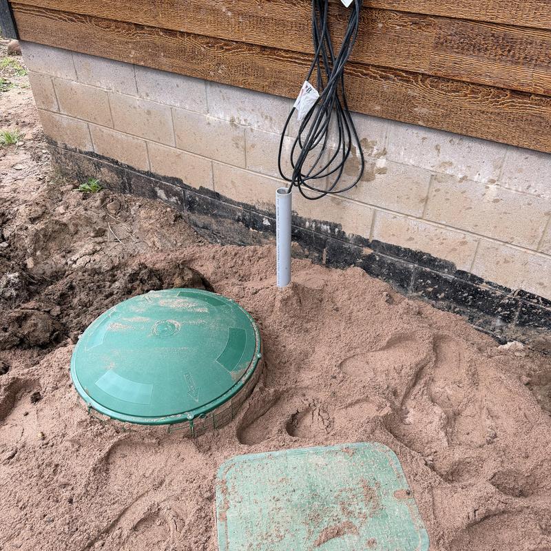 Liberty grinder pump with conduit and valve access Liberty grinder pump with conduit and valve access
