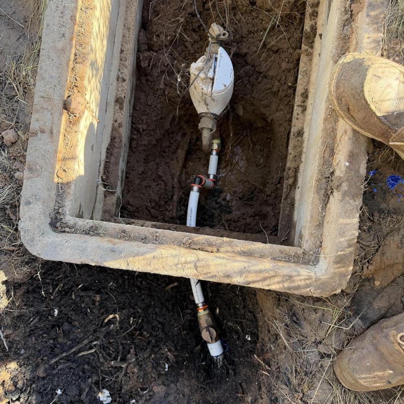 Main waterline with shut-off valve and meter box Main waterline with shut-off valve and meter box