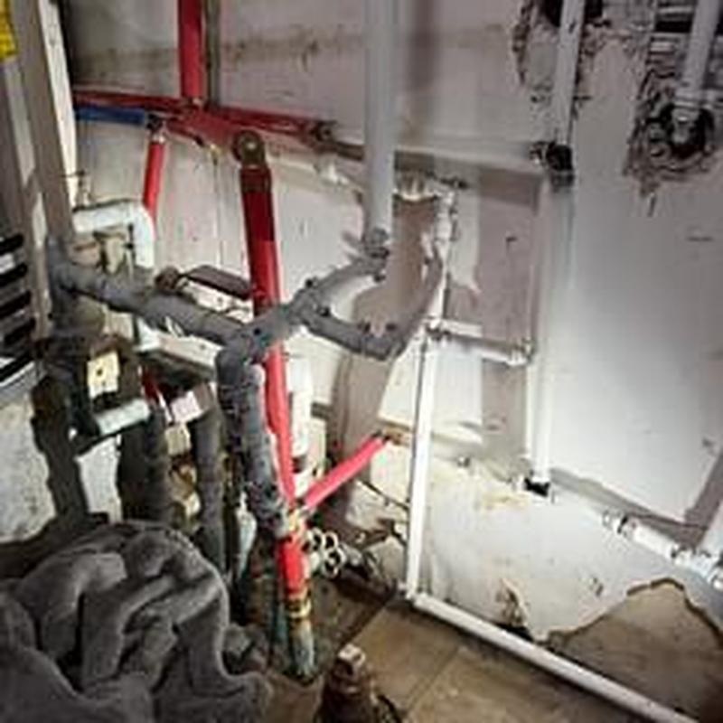 Hot water slab line with PEX piping replacement