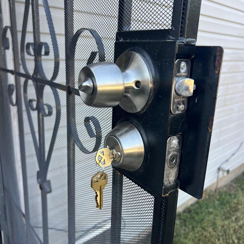 Security gate deadbolt lock with keys in door