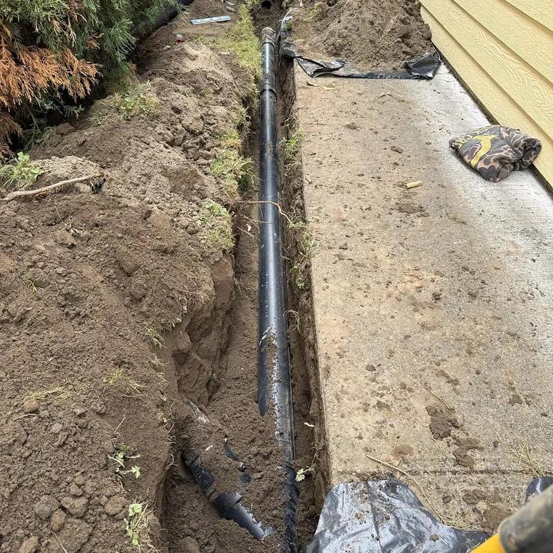 4” ABS sewer main line trench installation 4” ABS sewer main line trench installation