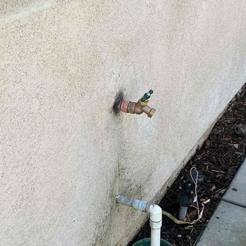 Hose bib installation on exterior stucco wall