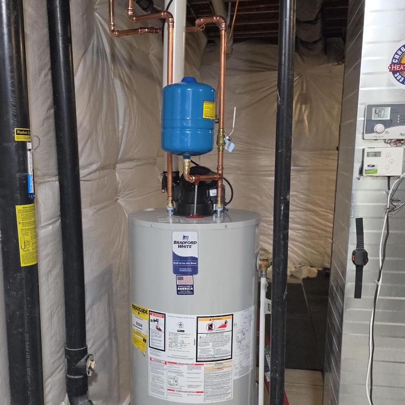 Power vent water heater with expansion tank installation