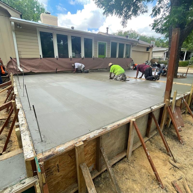 Concrete patio slab finishing on residential property Concrete patio slab finishing on residential property