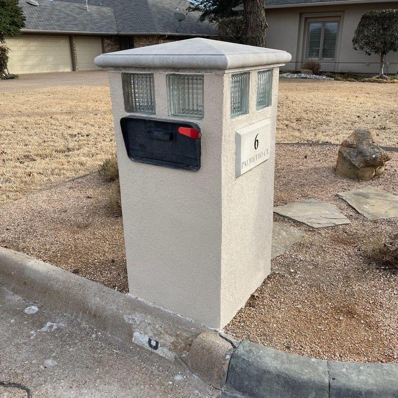 Stucco mailbox column with glass block detail Stucco mailbox column with glass block detail