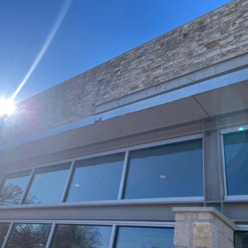 Stone facade and covered soffit exterior at church Stone facade and covered soffit exterior at church