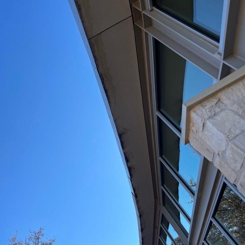 Covered soffit and window wall joint restoration Covered soffit and window wall joint restoration