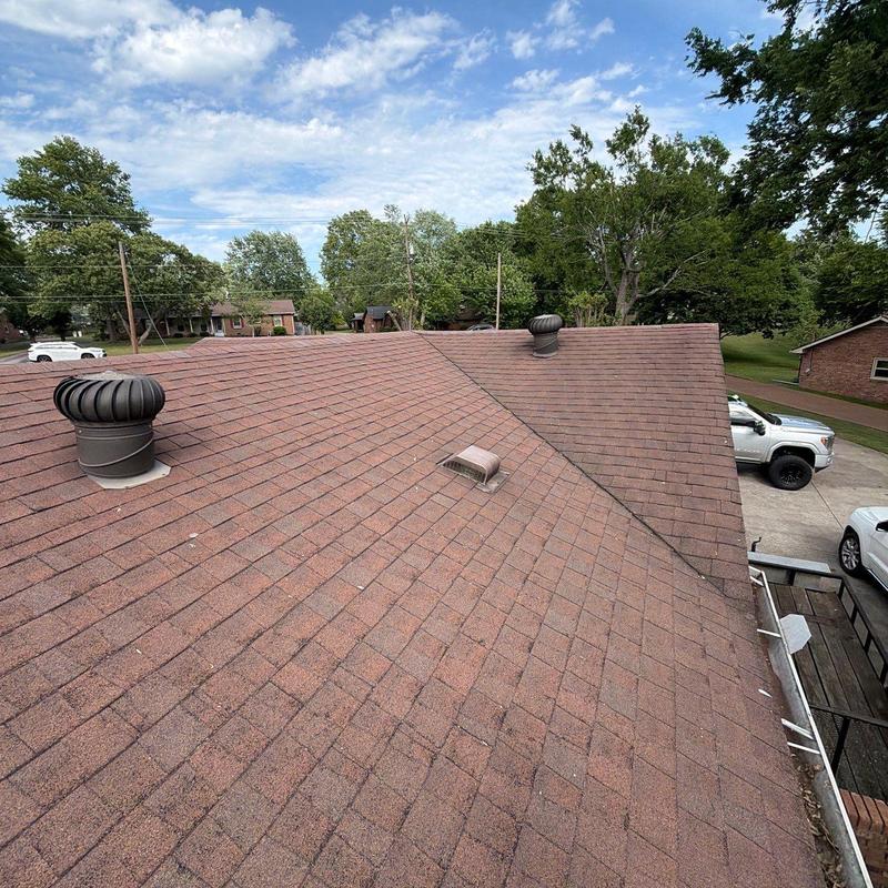 Asphalt shingle roof inspection for damage and wear