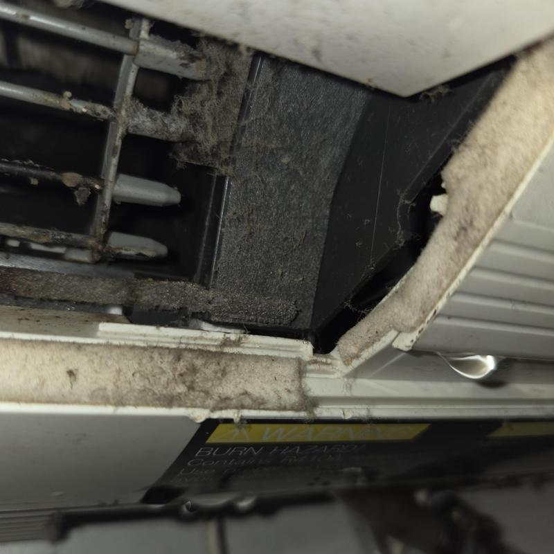 AC unit interior showing significant dust and leakage AC unit interior showing significant dust and leakage