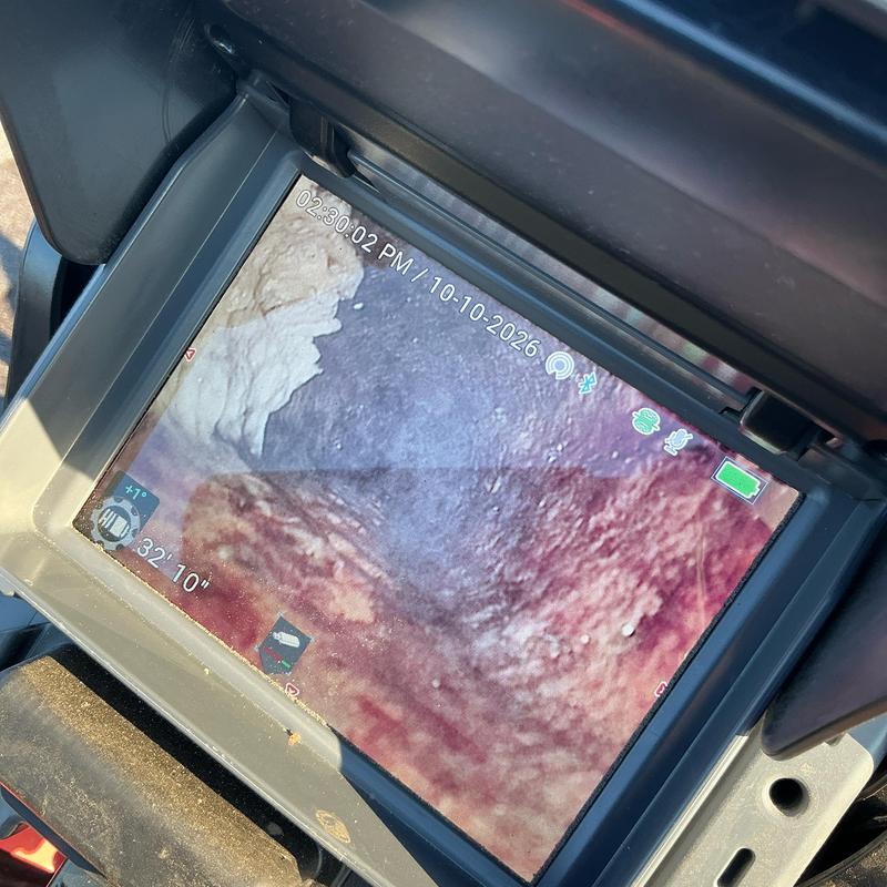 Sewer line camera showing major scale buildup