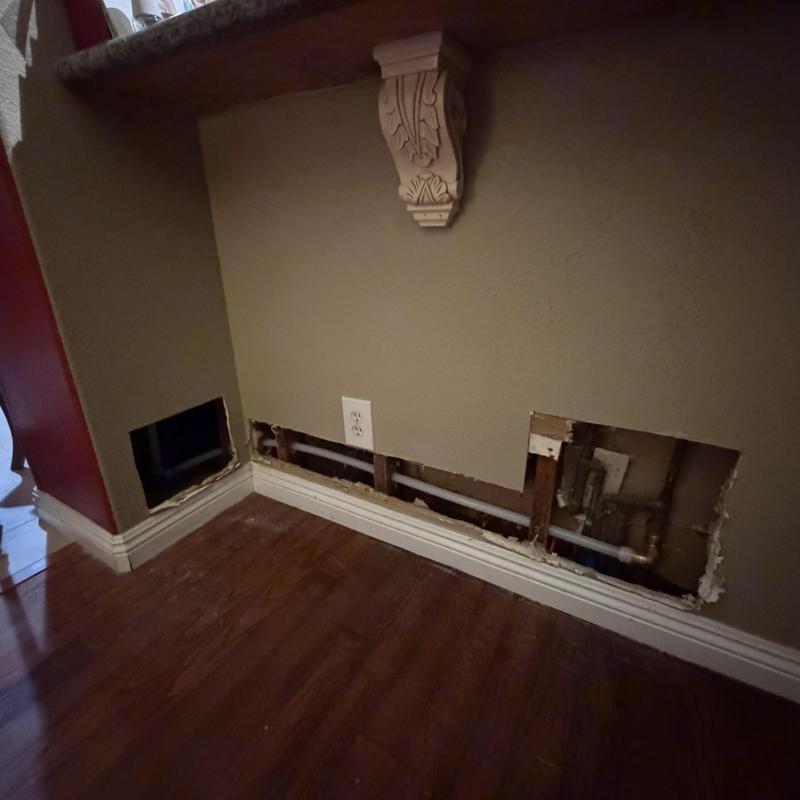 PEX-A water line reroute behind kitchen wall panels