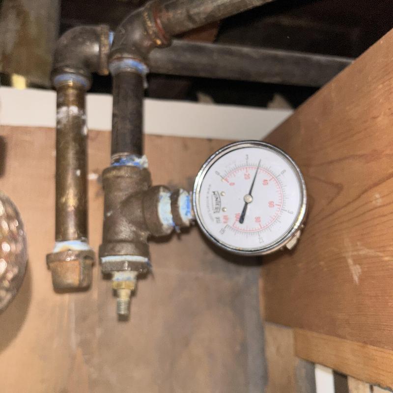Gas pressure gauge on oven piping system Gas pressure gauge on oven piping system