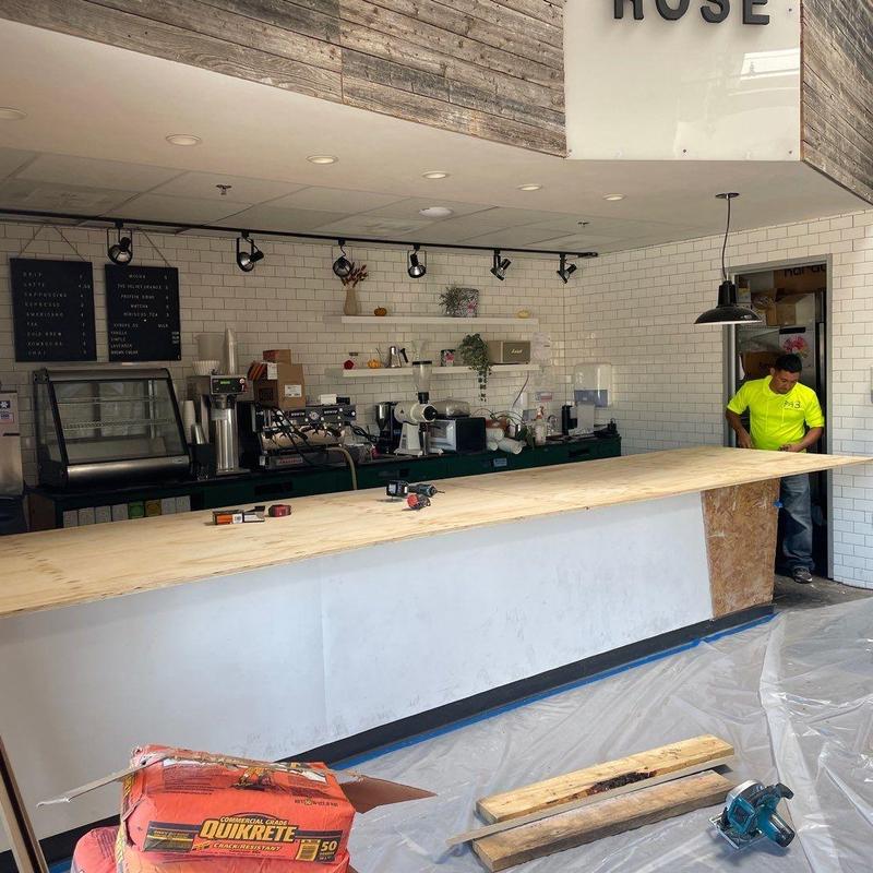 Concrete counter installation in cafe with tools Concrete counter installation in cafe with tools