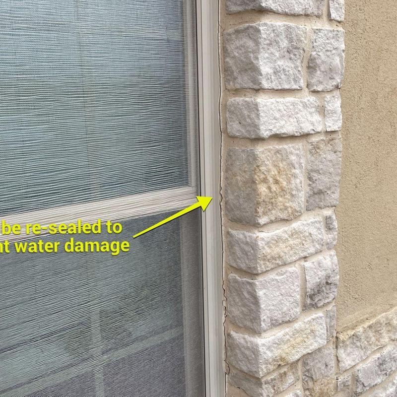 Window frame sealant repair near stone facade cracks Window frame sealant repair near stone facade cracks