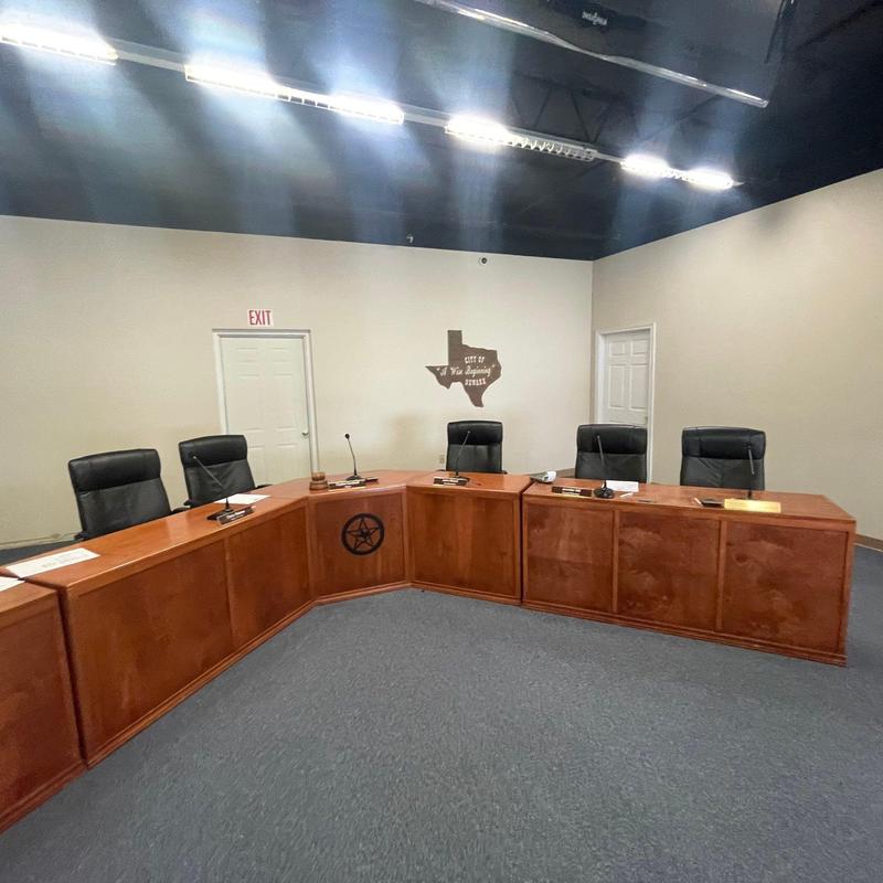 Council chamber wood desks and flooring installation Council chamber wood desks and flooring installation