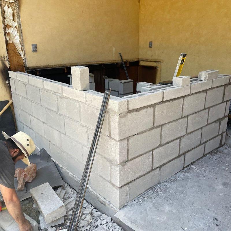Outdoor grill concrete block foundation rebuilding in progress Outdoor grill concrete block foundation rebuilding in progress